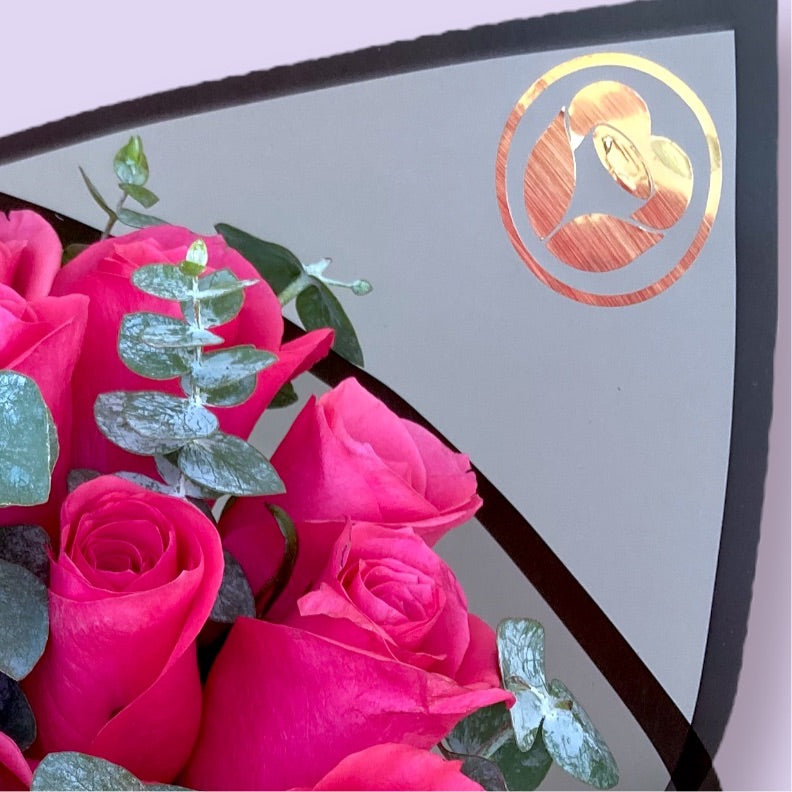 Ramo de Rosas fiusha y dolar